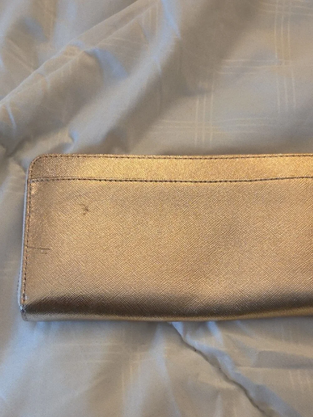 kate spade metallic rose gold zip-around wallet